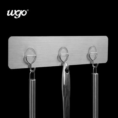 Aucun support auto-adhésif nécessaire de crochet de porte de trou de forage pour le stockage quotidien d'objets