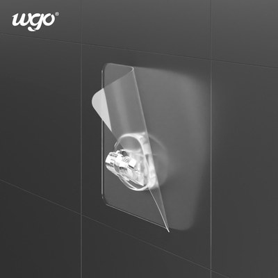 Le bâton collant transparent de boucle de WGO sur l'adhésif de support de balai de mur d'étagère de douche accroche clair/argent